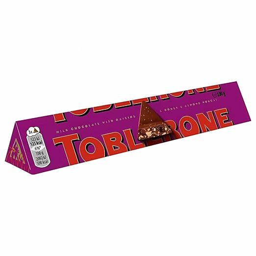 Toblerone Milk Chocolate With Raisins & Honey And Almond Noucat 100G